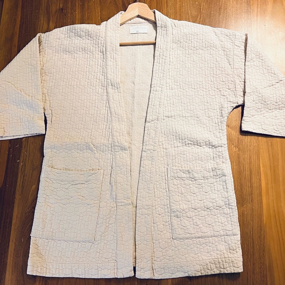 Curator Jules Cardigan in Mushroom